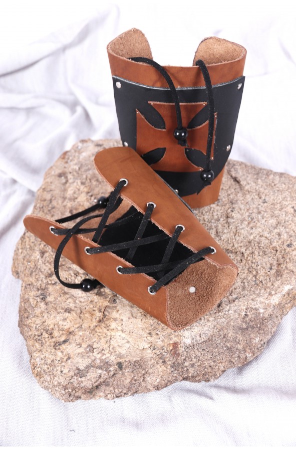 Brown and black medieval bracer with...
