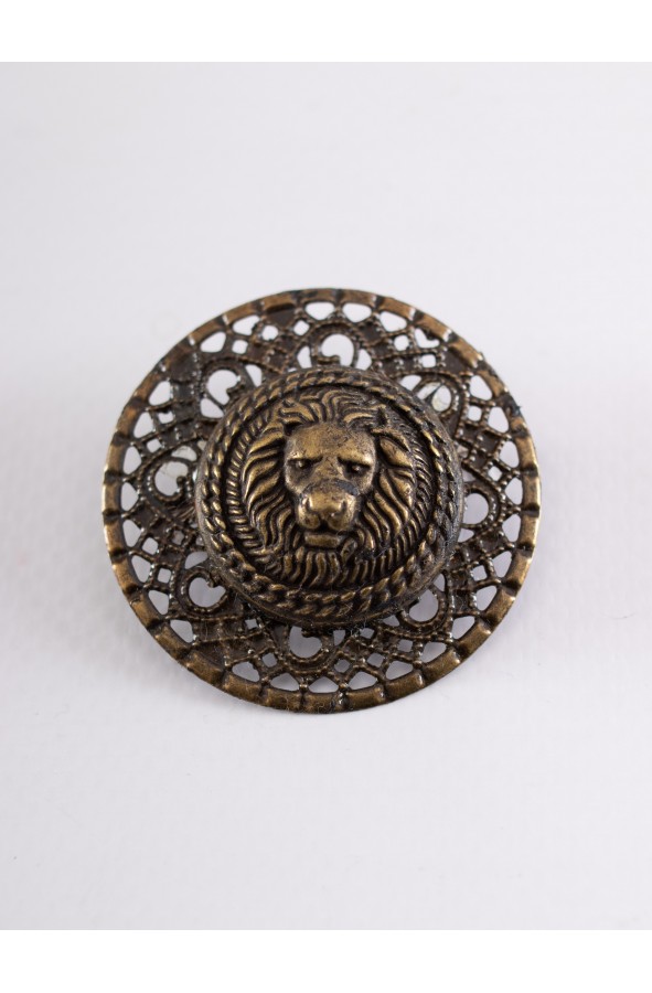 Golden Roman brooch with small lion