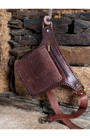 Hand-stitched brown leather...